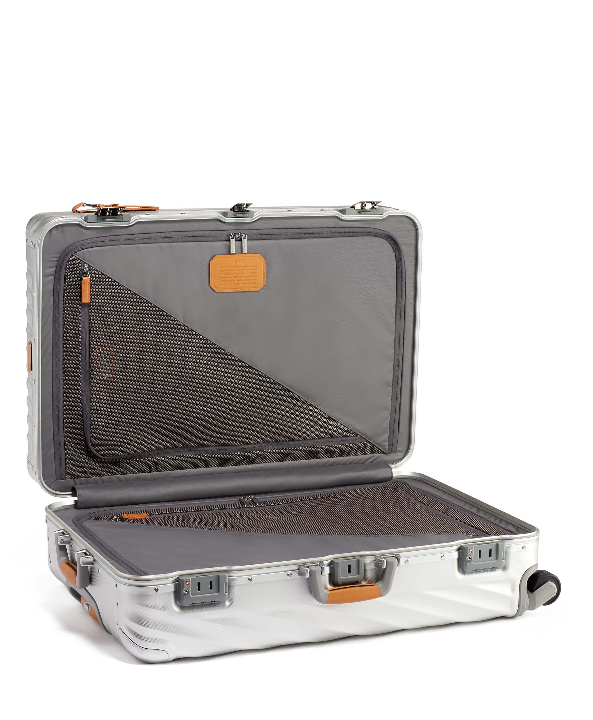 Tumi shop silver suitcase
