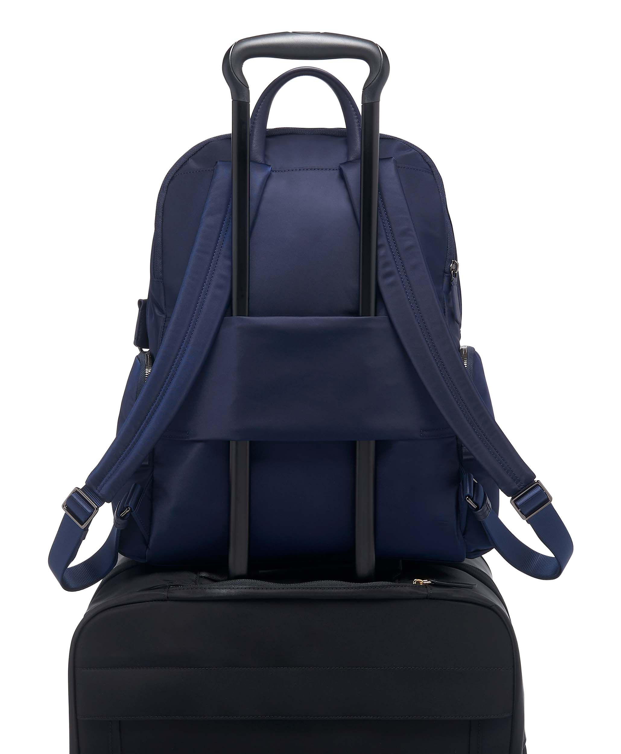 tumi navy blue backpack