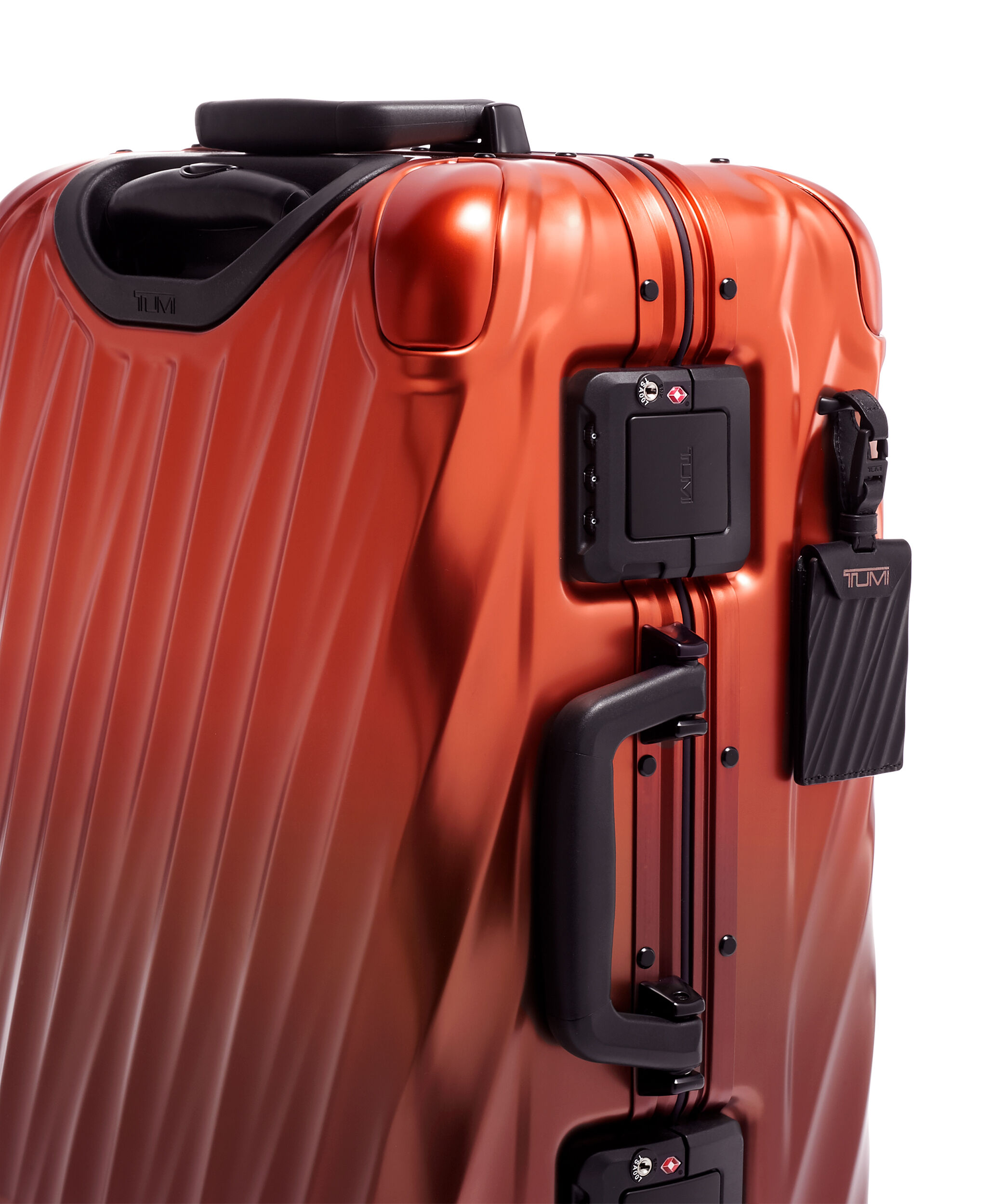 tumi orange luggage