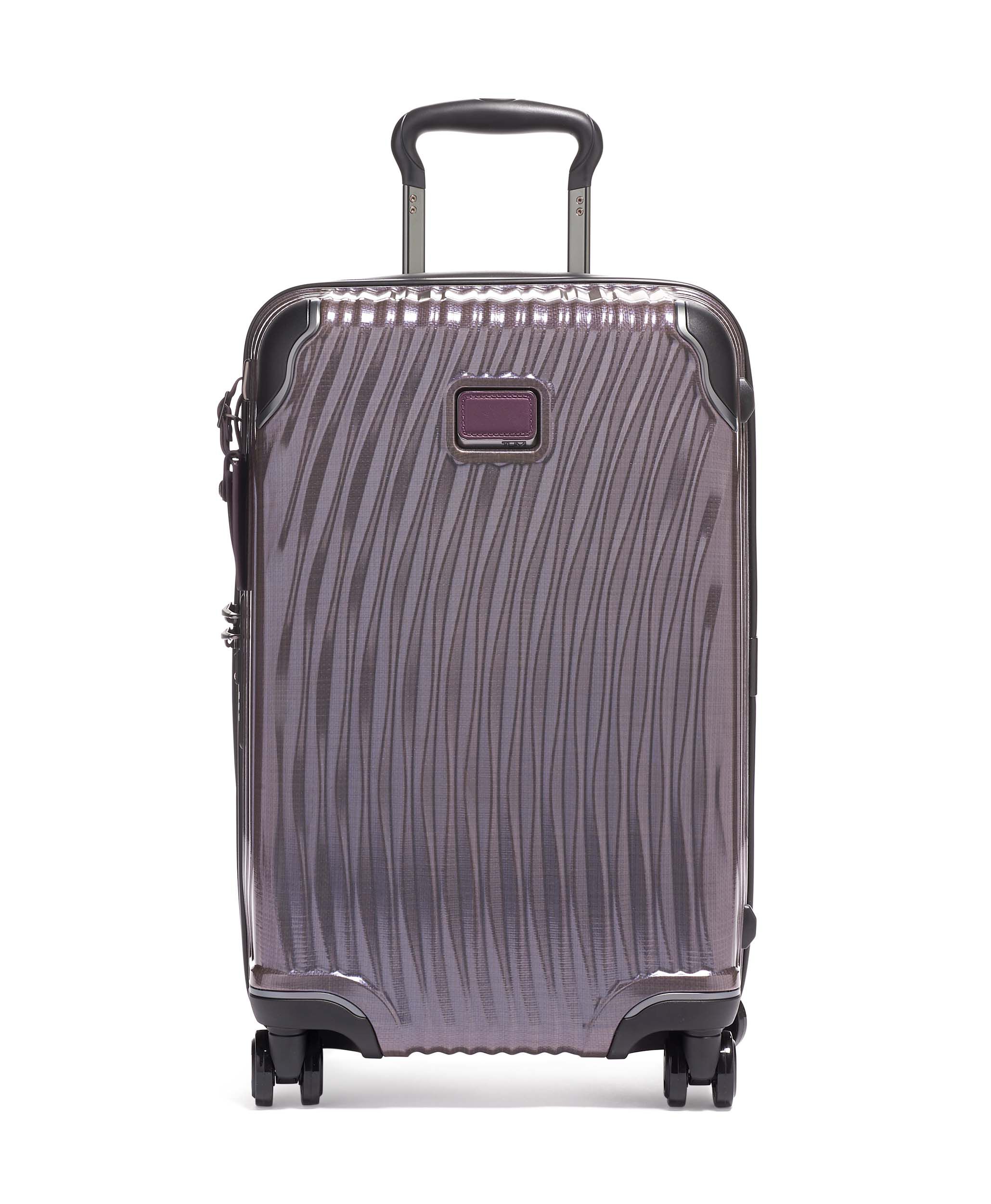 Tumi purple luggage
