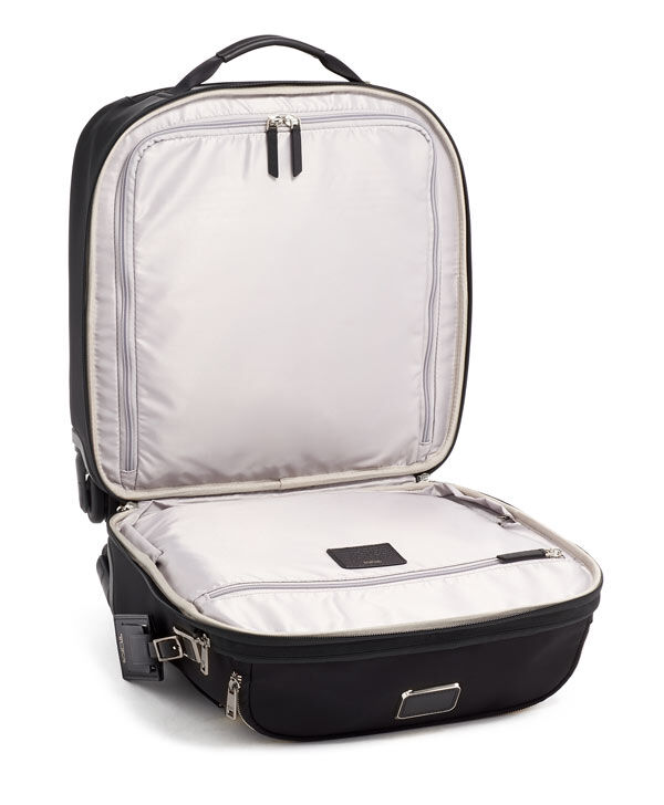 Tumi under the outlet seat luggage