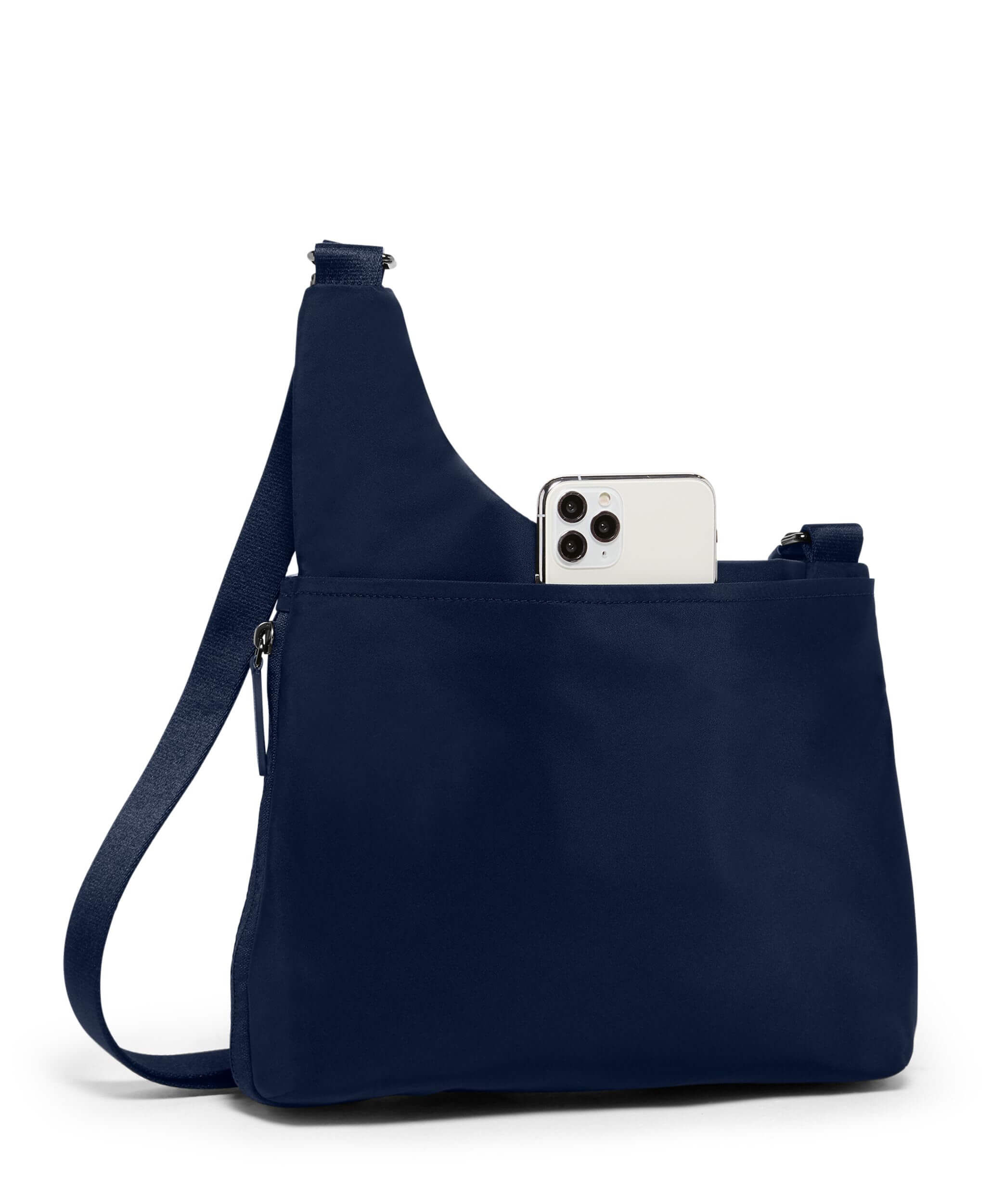 Tumi voyageur top sling bag